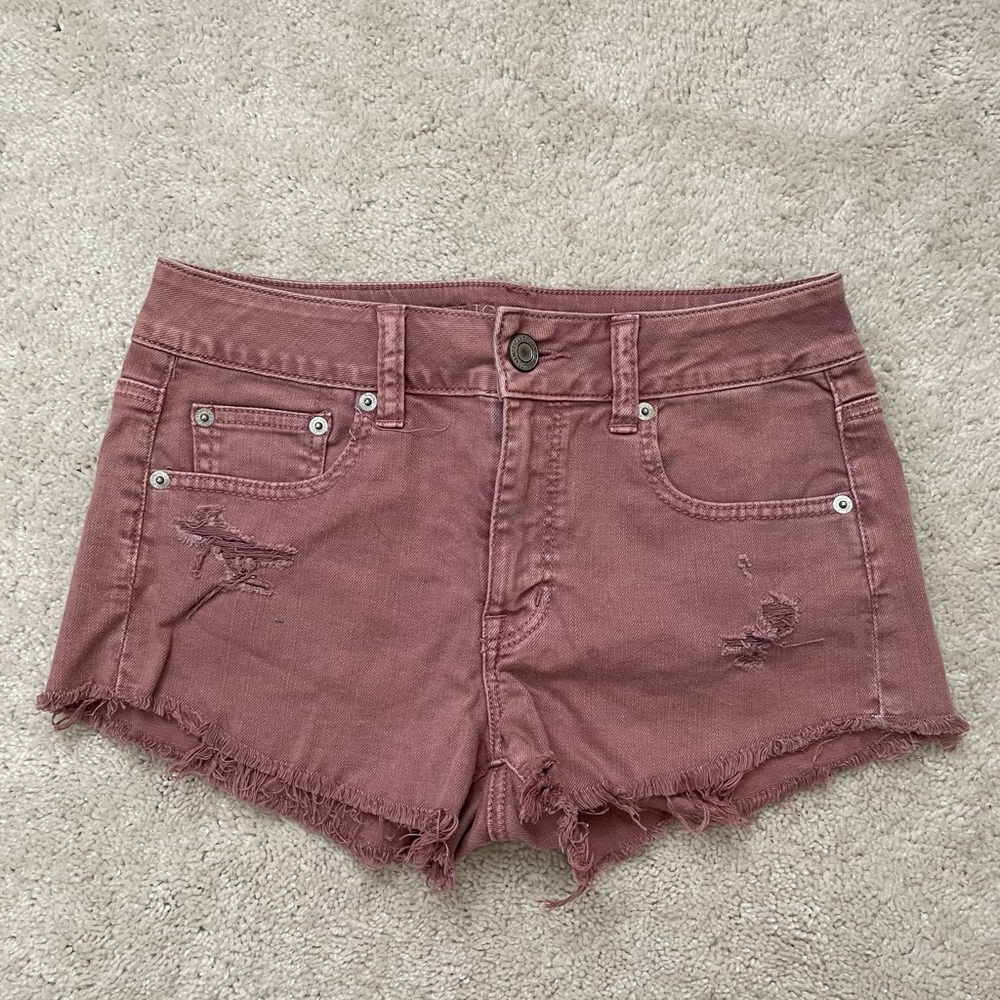 blush pink ripped jean shorts